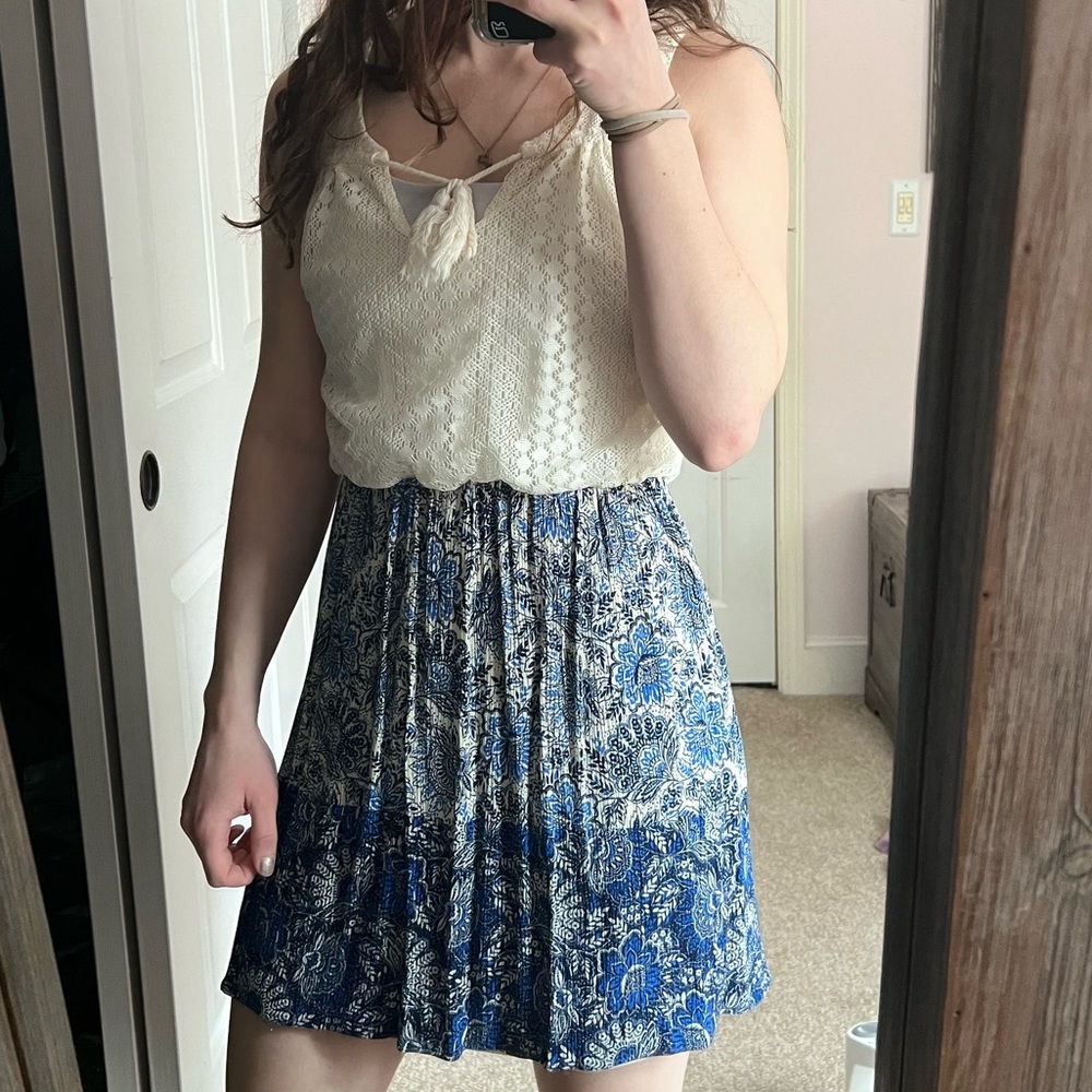 Tiered dress with lace cream top and blue patterned bottom